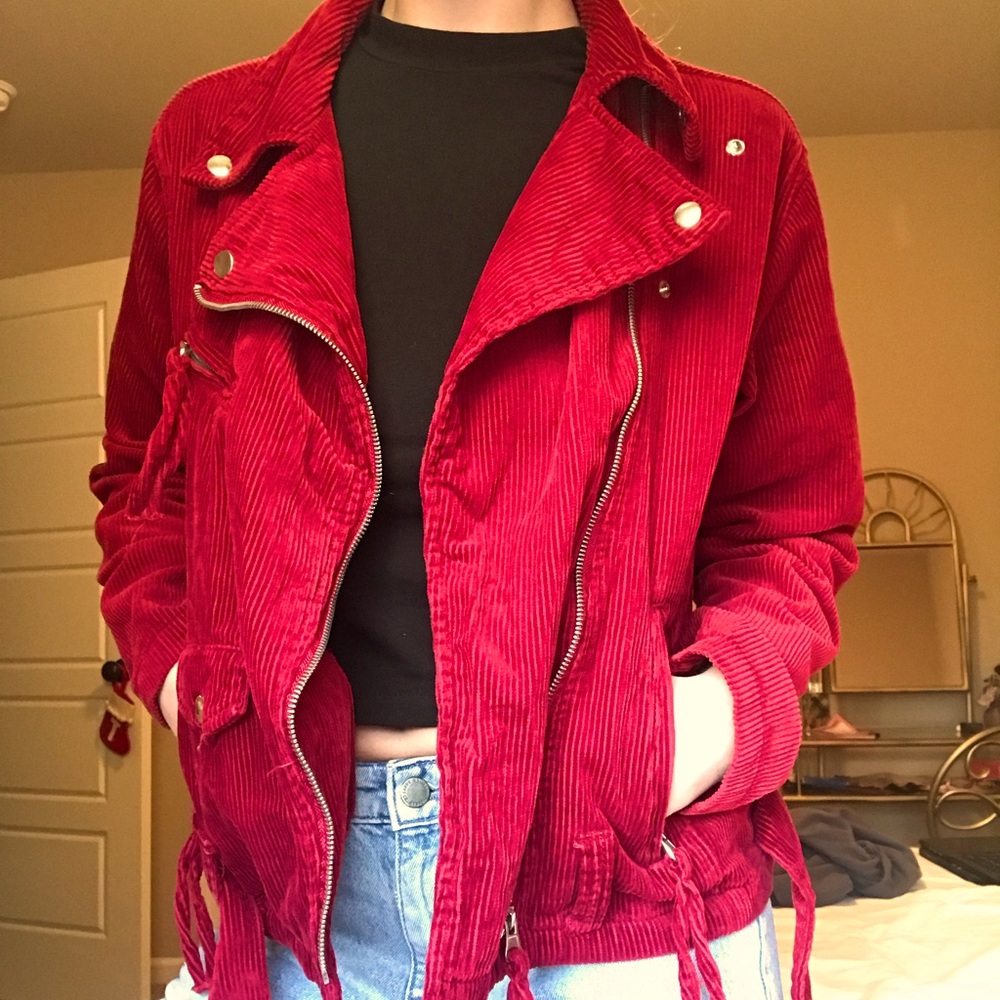Red corduroy jacket with silver buckle hardware